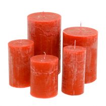 Barevné svíčky oranžové různých velikostí