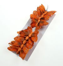 položky Ozdobný motýl na drátě oranžový 8cm 12ks