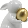 Floristik24 Králík se zlatým vejcem keramika, velikonoční dekorace elegantní bílá, zlatá V15cm