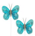 Floristik24 Dekorativní motýlci tyrkysová se třpytkami 7cm 4ks